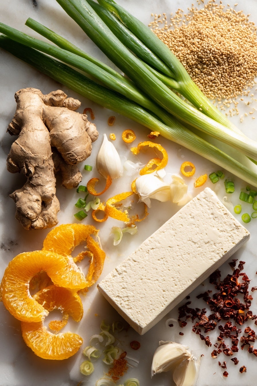 orange tofu - Flat lay of firm tofu block with its smooth, pale cream texture, vibrant fresh orange with bright orange zest curls, peeled garlic cloves showing their creamy white flesh, fresh ginger root with its light brown, knobby skin and fibrous interior, small red chili flakes scattered nearby, glossy green onions sliced into thin rings, dark brown sugar crystals in a small pile, and toasted sesame seeds with their tiny oval shapes and beige color, all beautifully arranged in a natural, balanced composition placed on white marbled surface, photo taken with an iphone --ar 2:3 --v 7