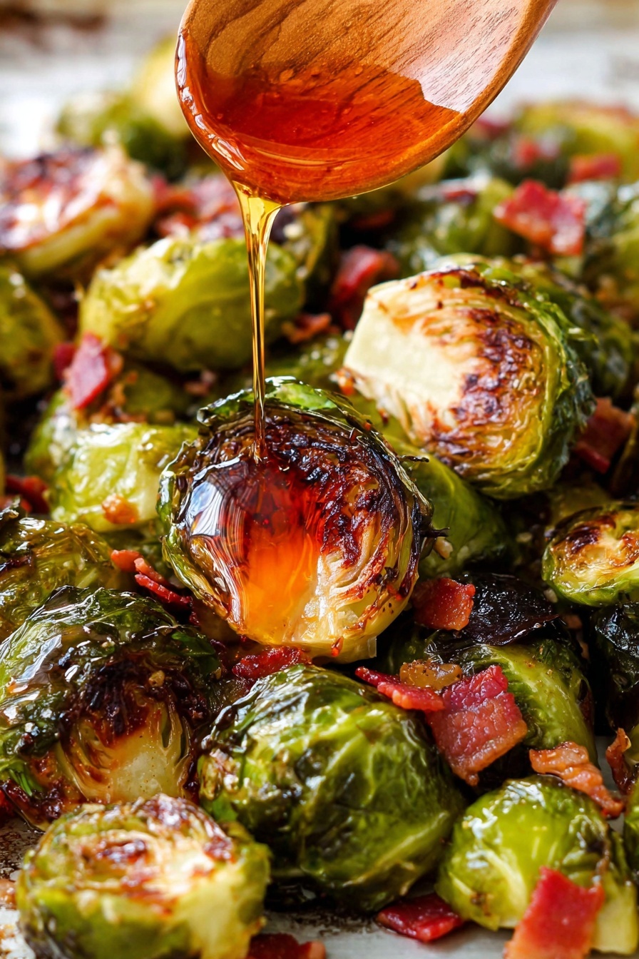 The image shows roasted Brussels sprouts with a golden brown and slightly crispy outer layer mixed with small pieces of red bacon scattered around. A thick amber-colored syrup is being poured over the top, falling down in a smooth stream that glistens under the light. The Brussels sprouts have a mix of green and caramelized dark brown spots, giving a textured and shiny look. Near the top right, a wooden spoon is partially visible, lifting some sprouts. The scene is set on a surface with white marbled texture. photo taken with an iphone --ar 2:3 --v 7