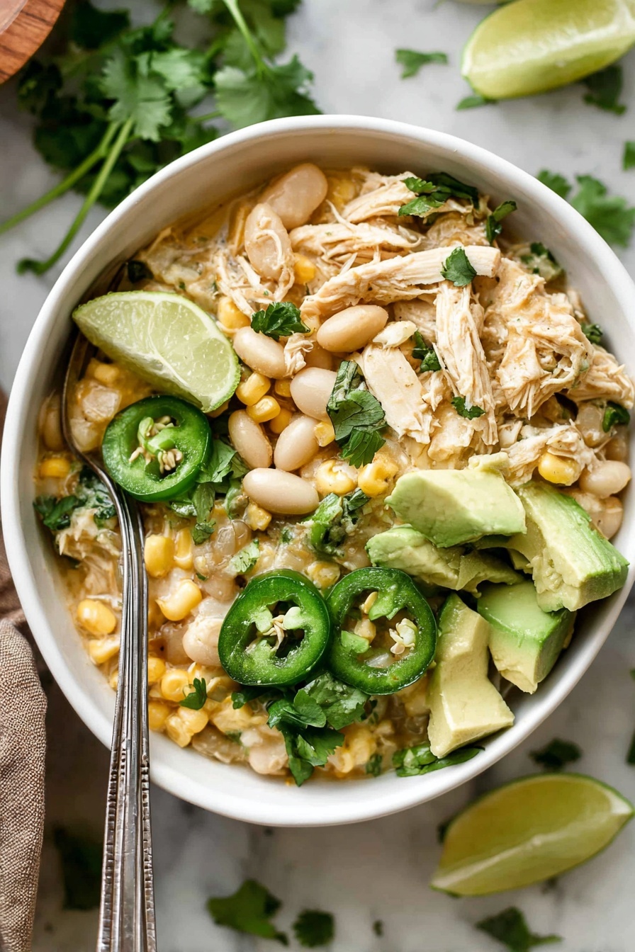 Inside a shiny silver pot, there are several layers of ingredients. On the left side, there is a layer of yellow corn pieces, and next to it on the right, there is a layer of light brown beans. In the middle, there is a thick green paste, and on top of some parts, there are small piles of white powder and light brown powder. The mixture looks wet with some liquid around it. The pot is on a white marbled surface. photo taken with an iphone --ar 2:3 --v 7
